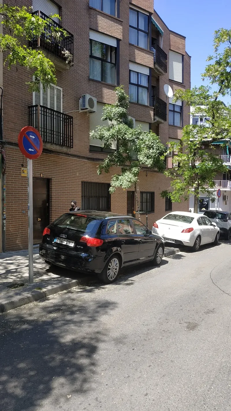 Narrow sidewalks blocked by badly parked cars